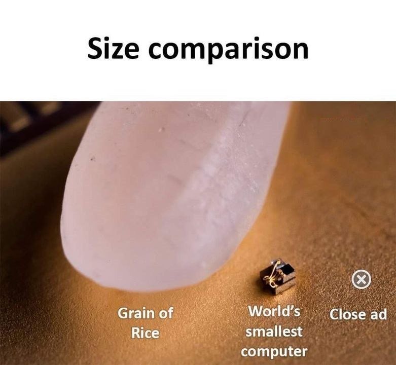 Size comparison grain of rice world's close ad smallest computer