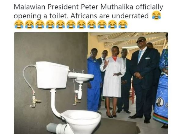 Malawian president peter muthalika officially opening toilet. africans are under