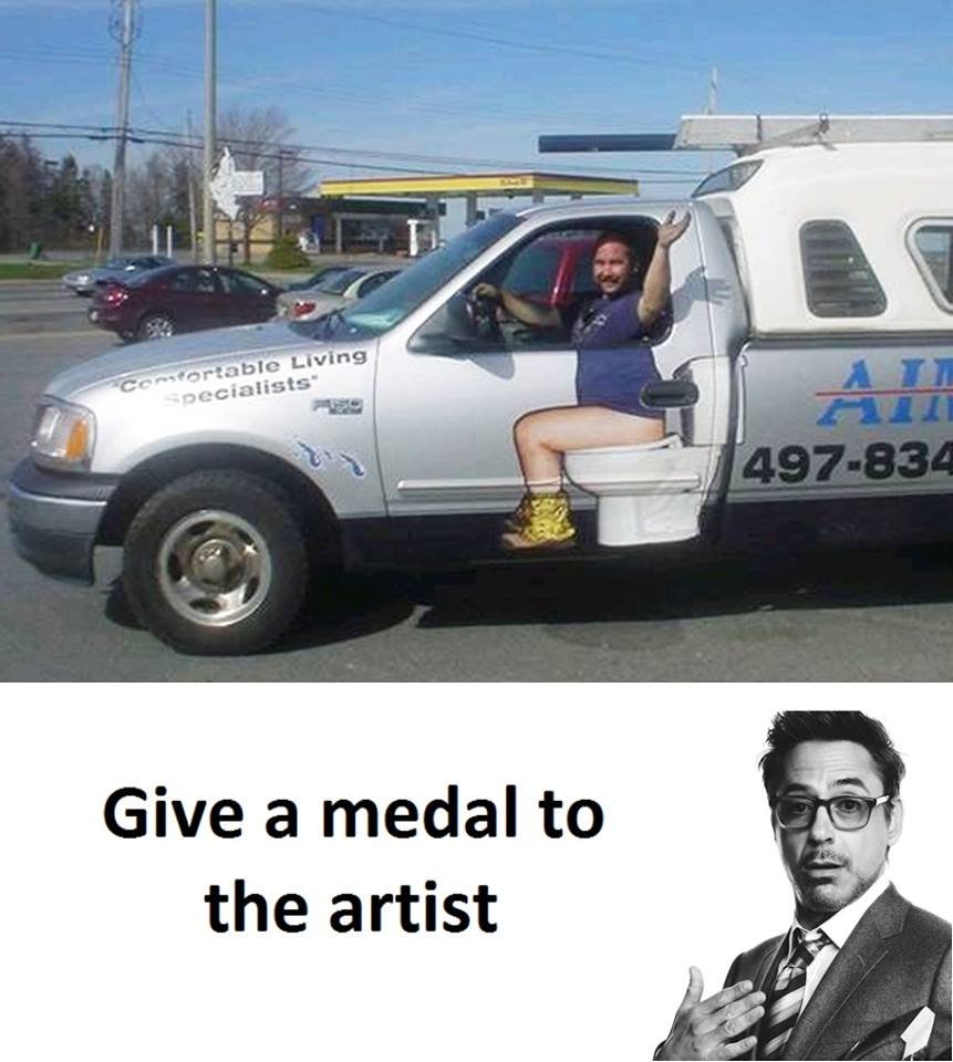 Living cocorablc pccialists 44 497.834 give a medal to the artist