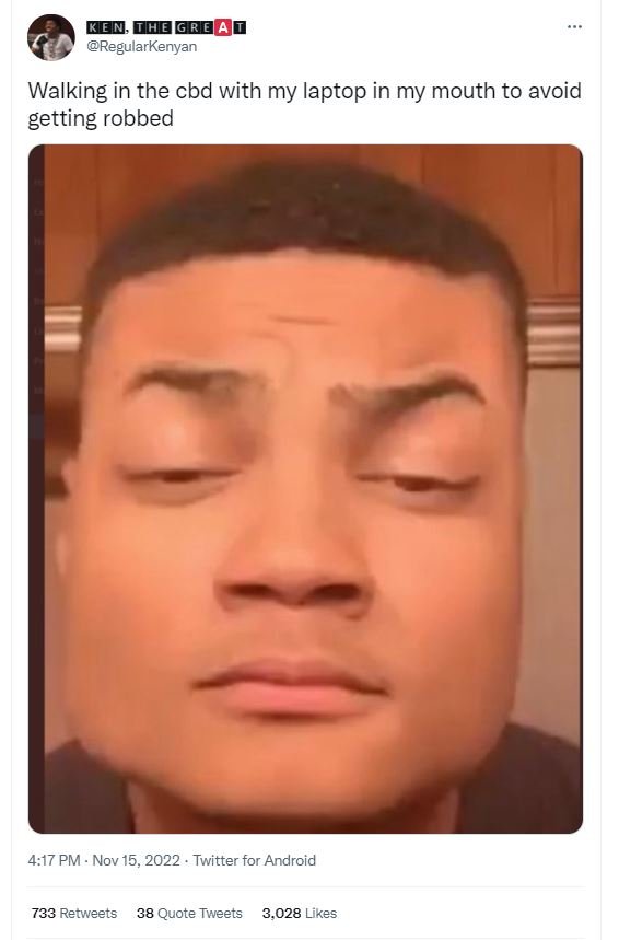 Mon mord regularkenyan walking in the cbd with my laptop in my mouth to avoid ge