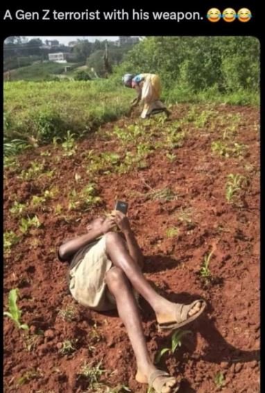 A gen z terrorist with his weapon. 00