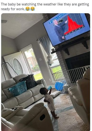 The baby be watching the weather like they are getting ready for work. 7oon