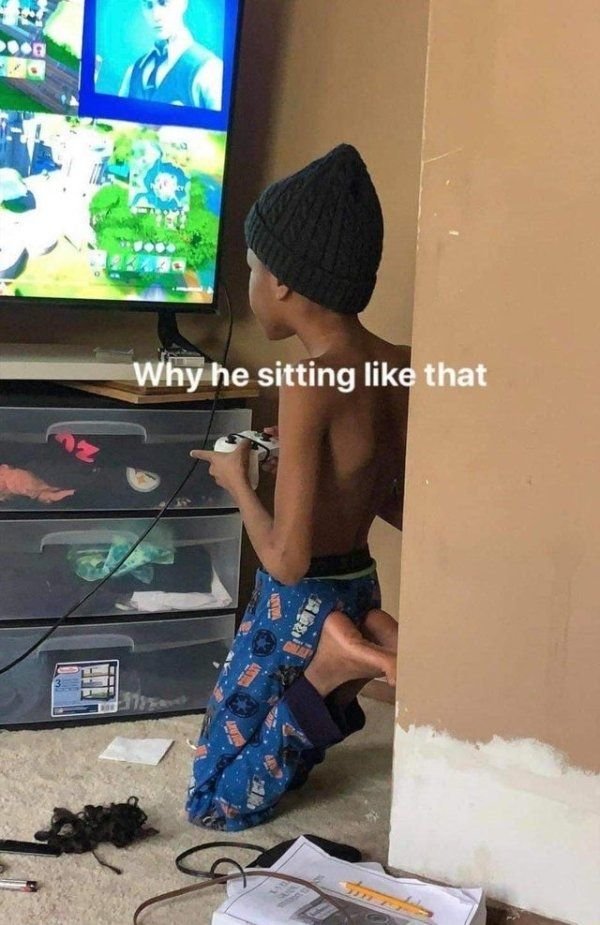 Why he sitting like that