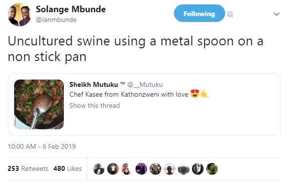 Solange mbunde ianmbunde following uncultured swine using a metal spoon on a non