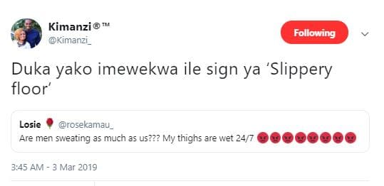 Kimanzi kimanzı _ following duka yako imewekwa ile sign ya 'slippery floor' losi