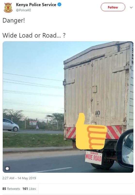 Kenya police service policeke follow danger! wide load or road. oanger khde road