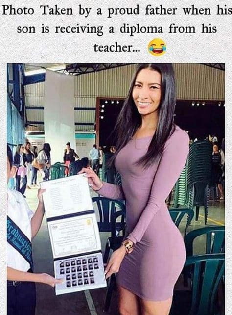 Photo taken by proud father when his son is receiving diploma from his teacher