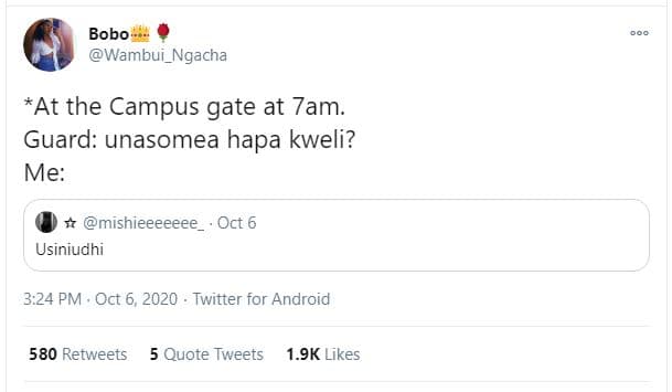 Bobo wambui_ngacha at the campus gate at 7am. guard unasomea hapa kweli? me 5 mi