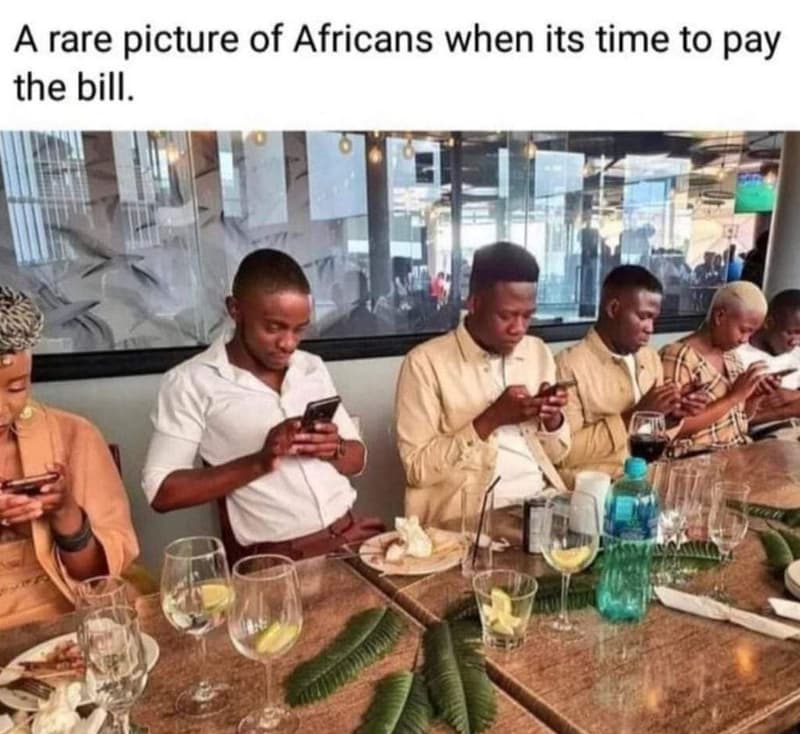 A rare picture of africans when its time to pay the bill.