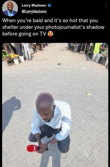 Larry madowo lairymadono when you're bald and it's so hot that you shelter under