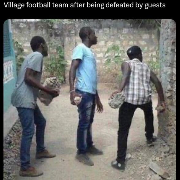 Village football team after being defeated by guests