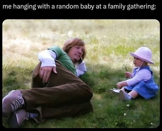 Me hanging with a random baby at a family gathering